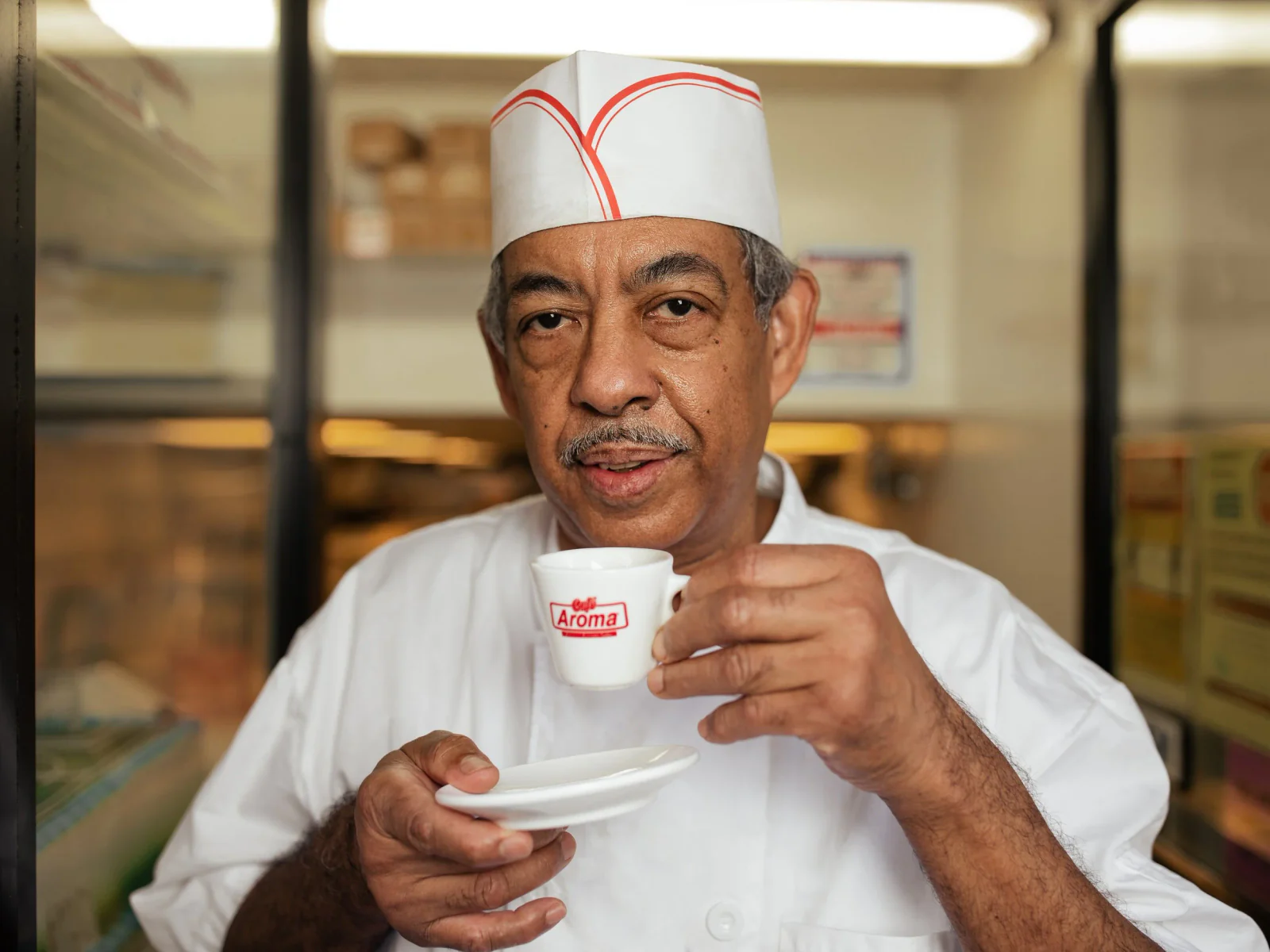 Chef portrait holding a coffee cup