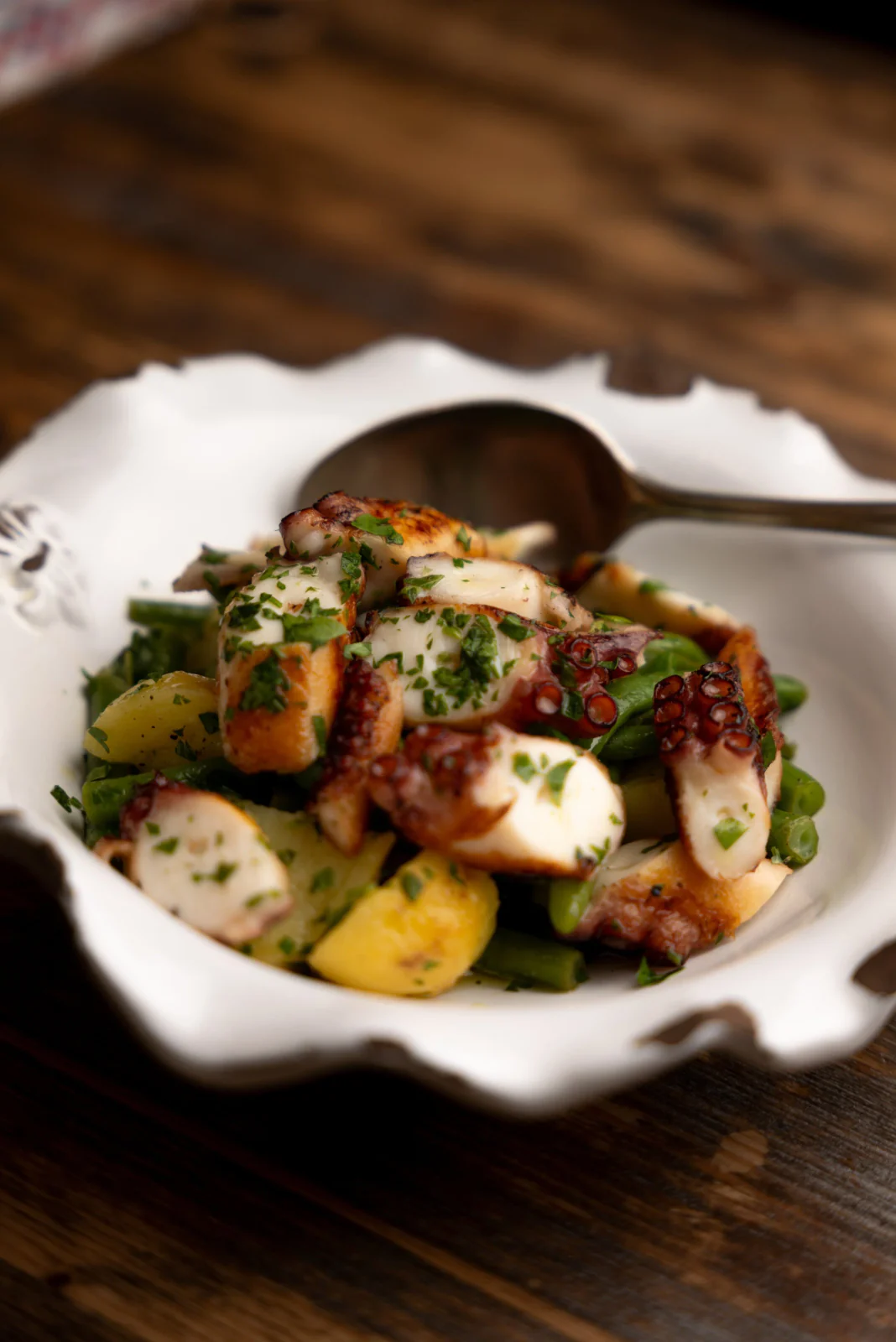 Octopus salad with potatoes and herbs